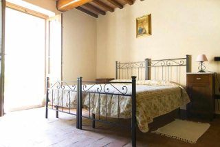 The family bedroom has 4 single beds, two of which can be joined to make a double bed